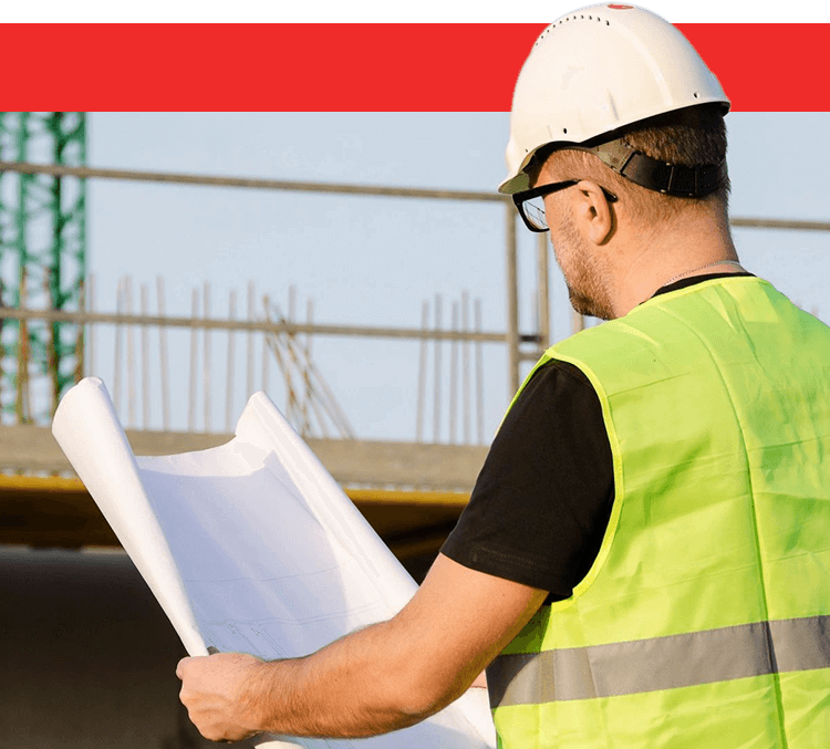 Construction Worker Checking the Construction Plan Chart